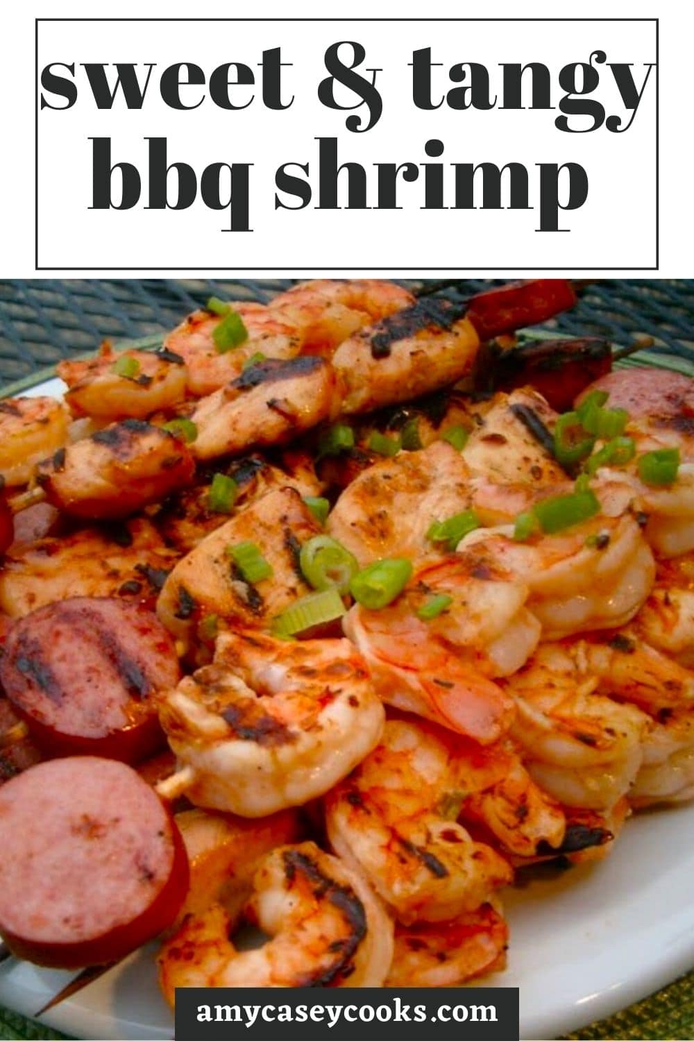 bbq shrimp and kielbasa on wooden skewers.