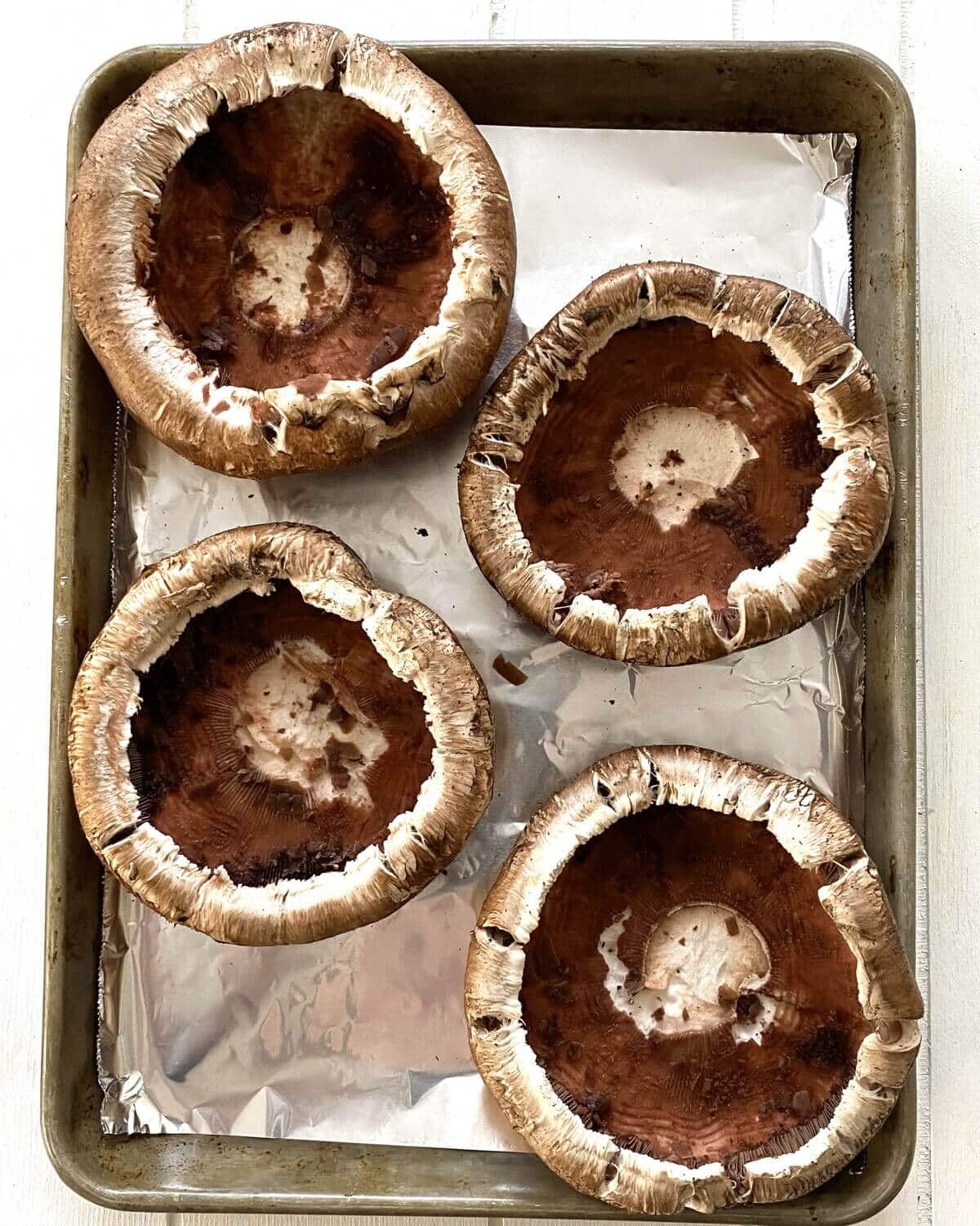 4 cleaned portobello mushroom caps.