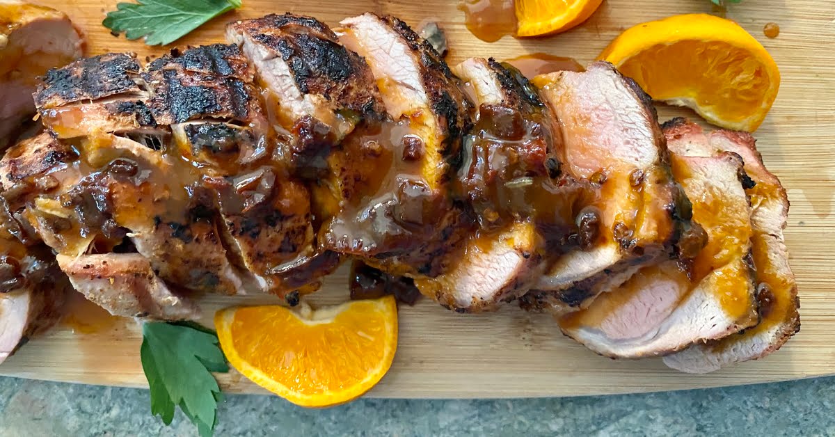 a few slices of grilled pork with chipotle sauce