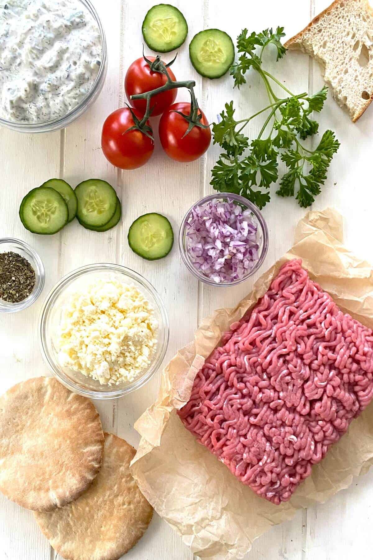 ground turkey, chopped onion, cucumber, tomatoes, feta cheese, pita bread.