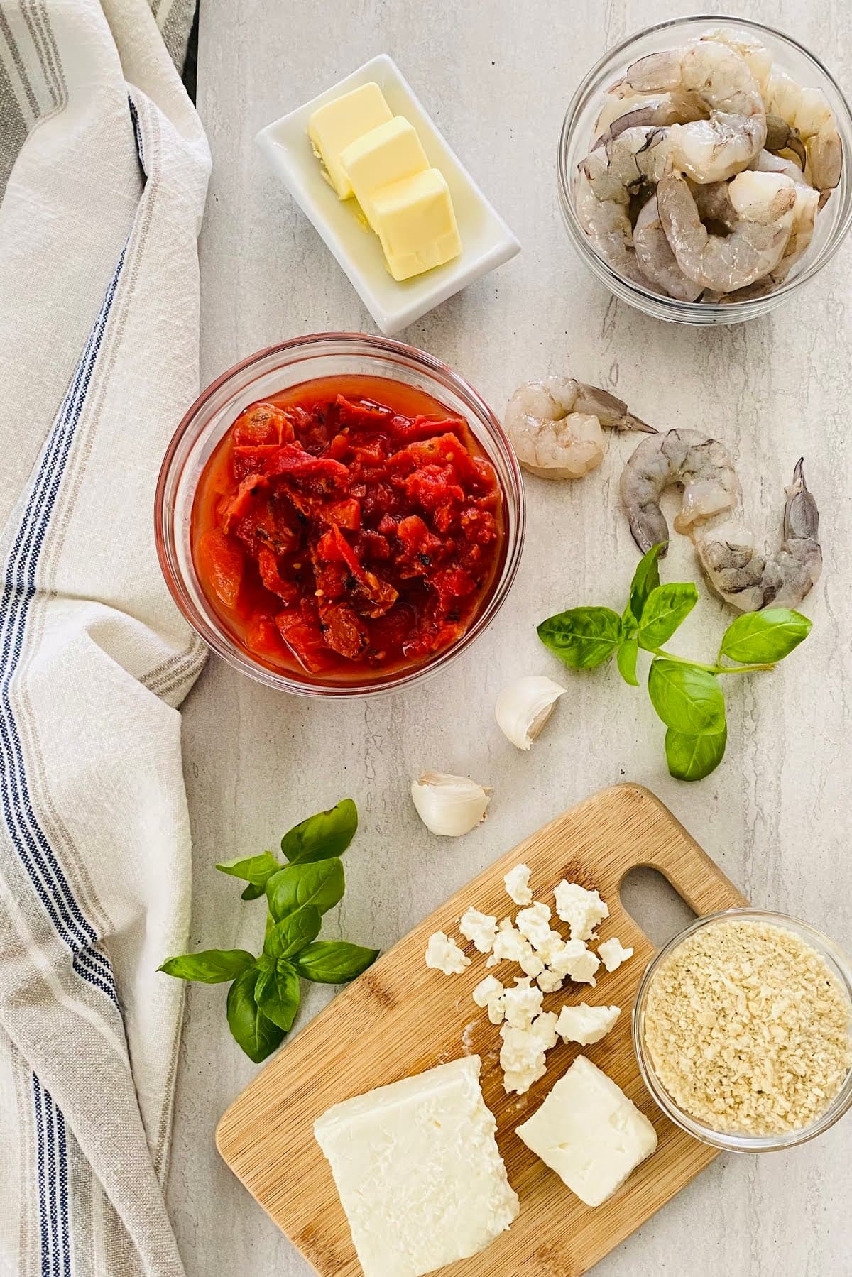 shrimp, feta, tomatoes, panko, basil, butter, garlic