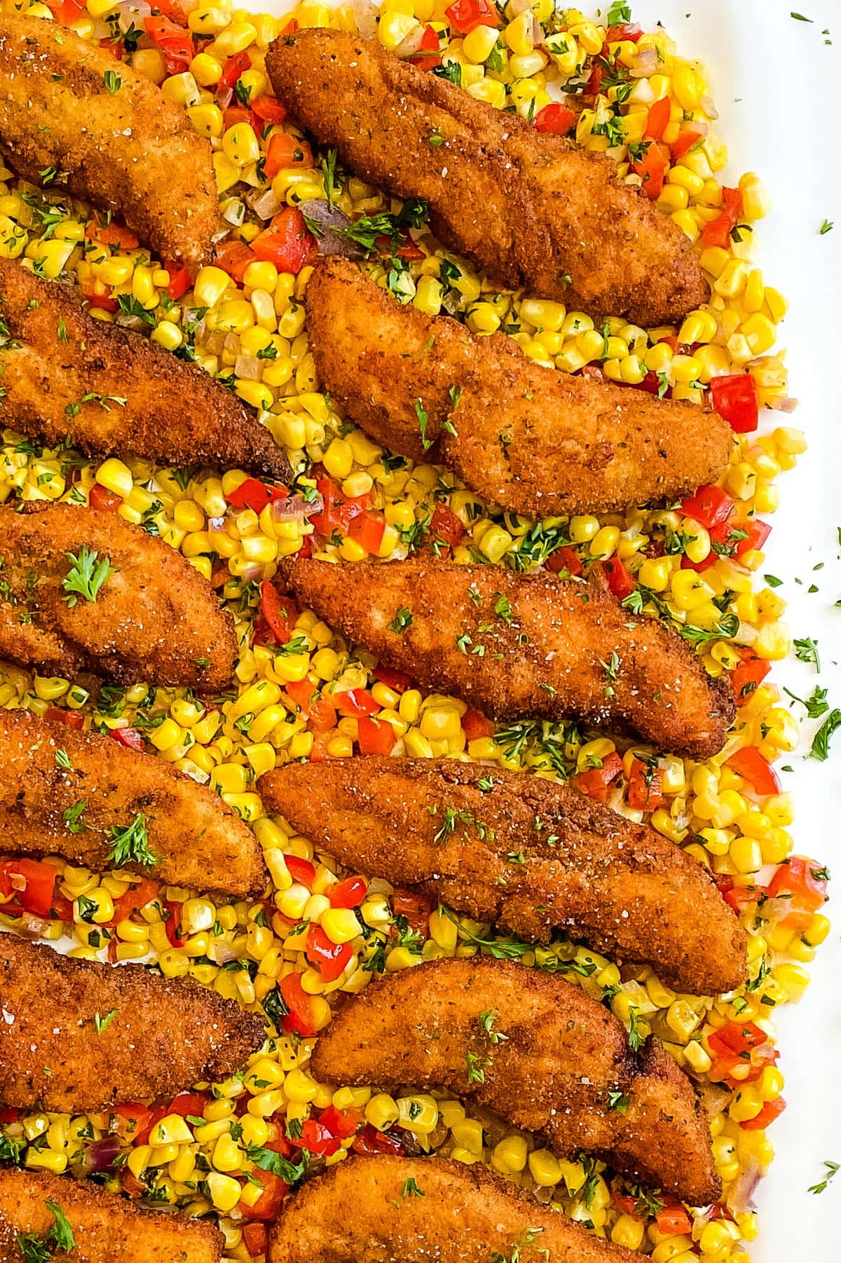 Pan Fried Chicken Tenders with Fresh Corn Sauté