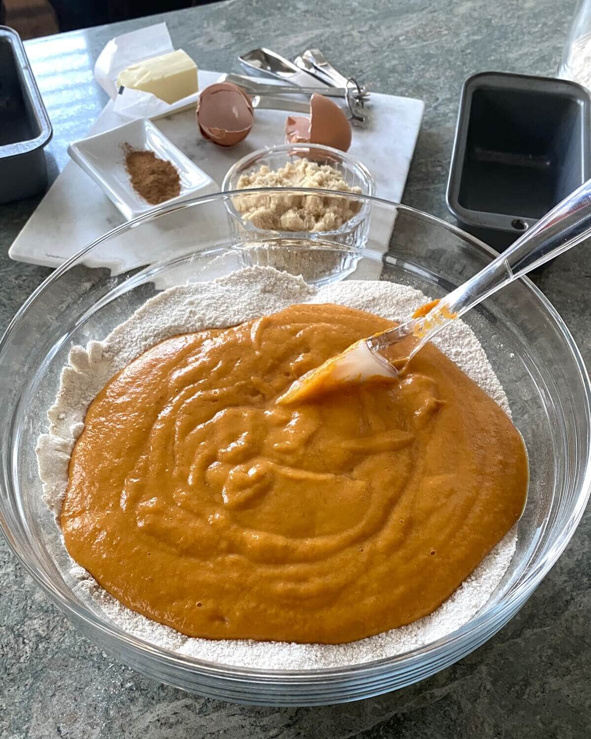 Wet ingredients for pumpkin bread with streusel topping recipe.