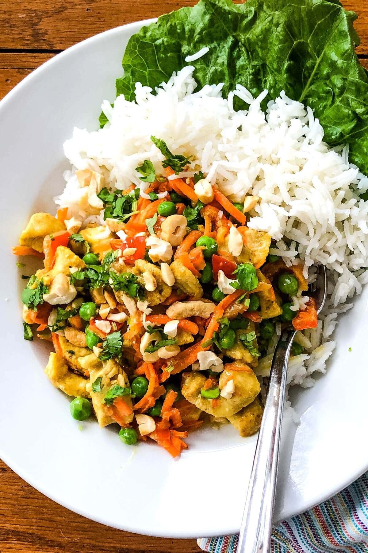 bowl of Thai chicken with rice.