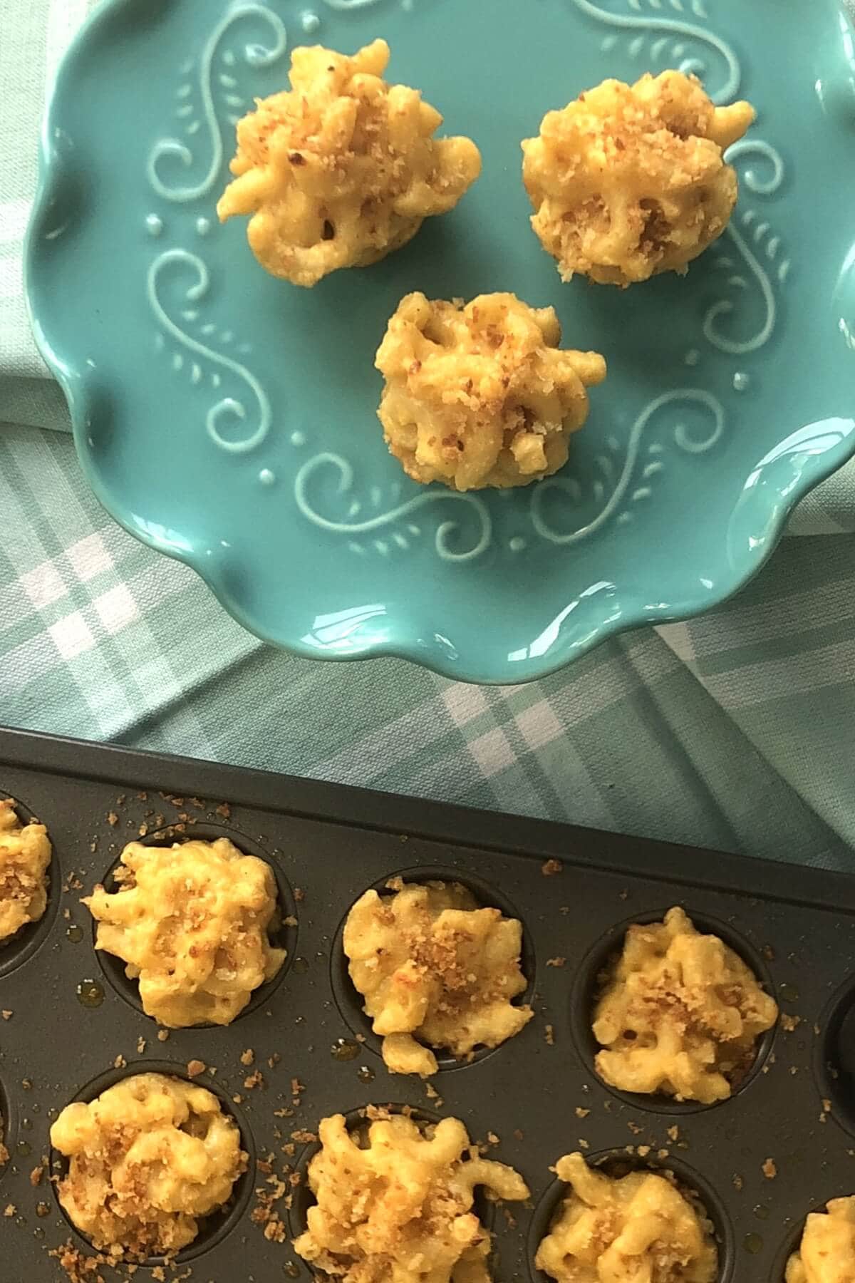 mini muffin pan with macaroni and cheese cups.