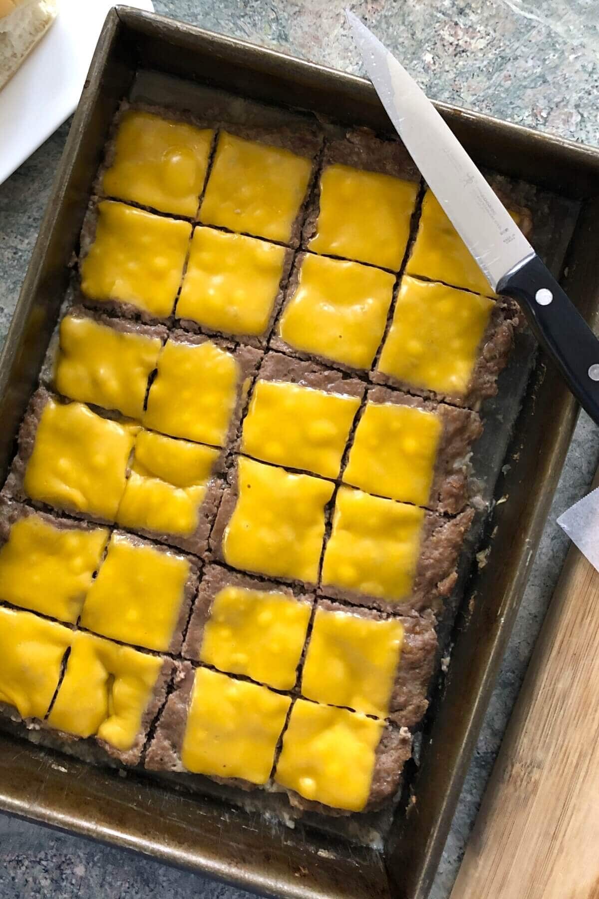 large patty cut into sliders for a crowd.