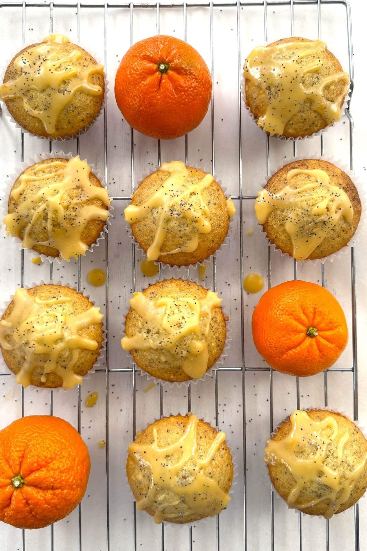 Poppy seed muffins on a cooling rack.