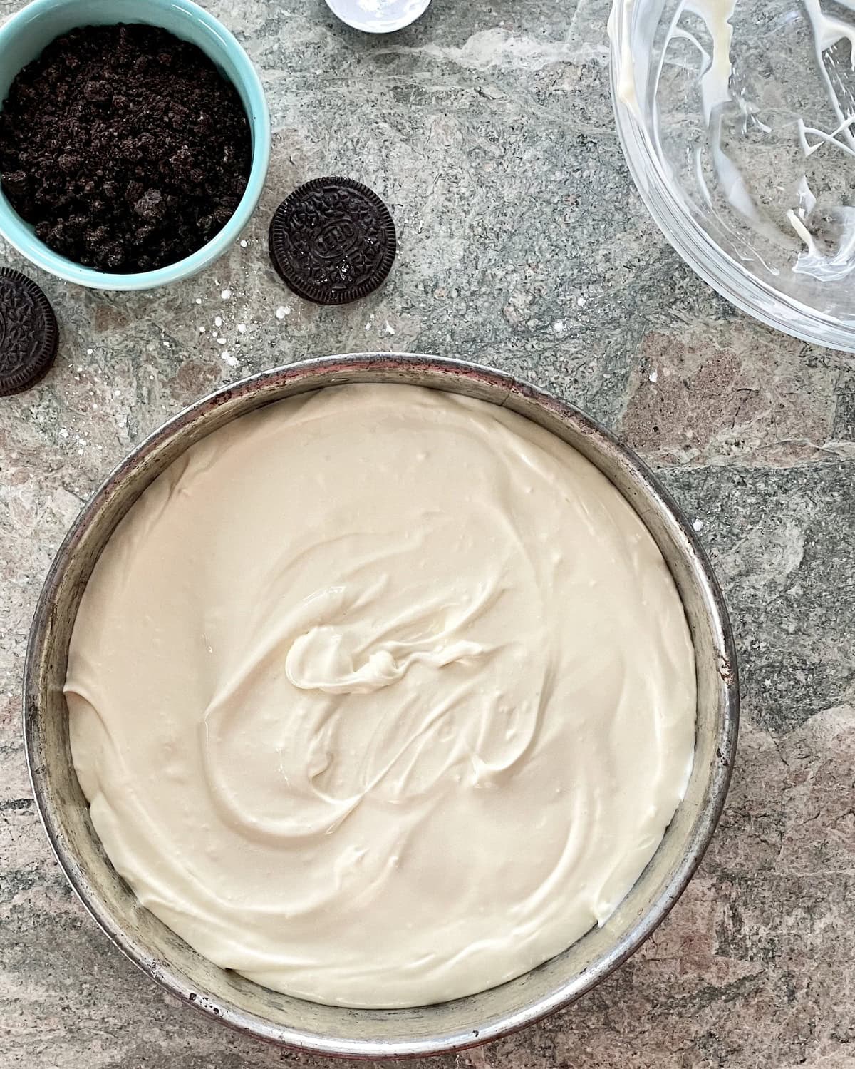 Cheesecake batter spread over crust.
