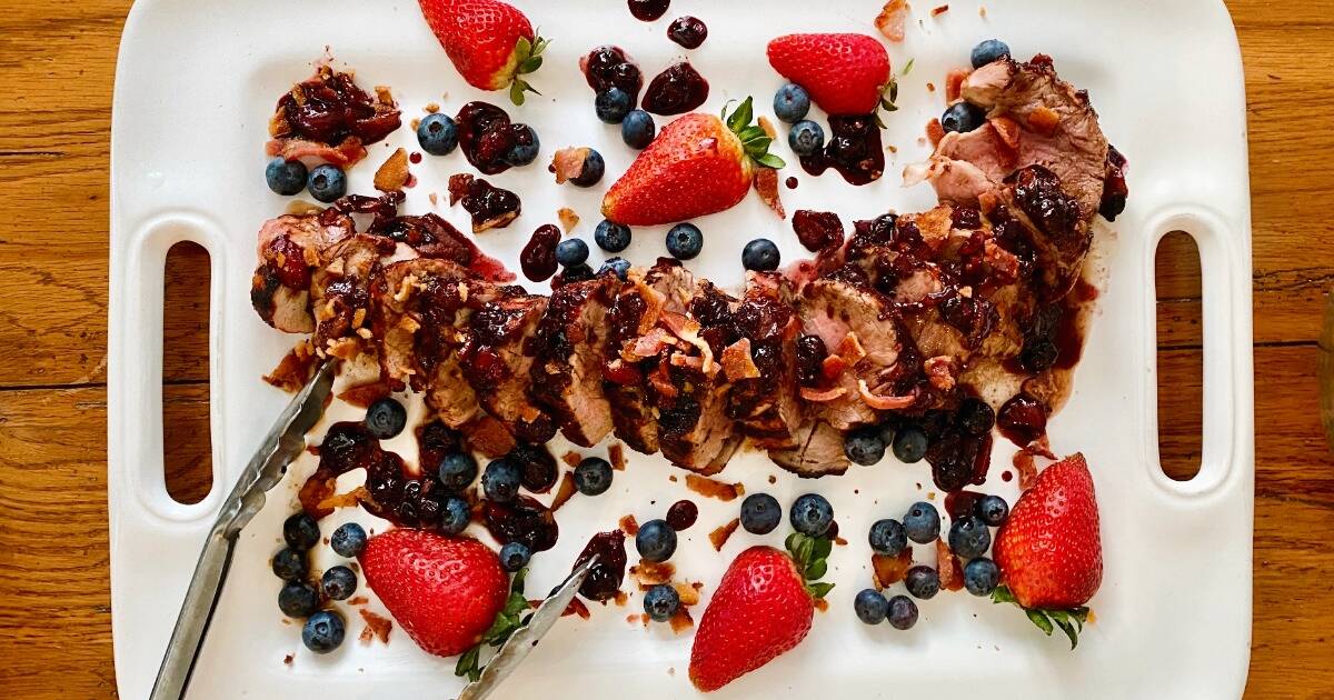 grilled pork with blueberries, strawberries and bacon