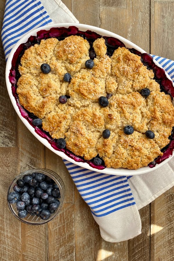 a fruit dessert with a cake like topping