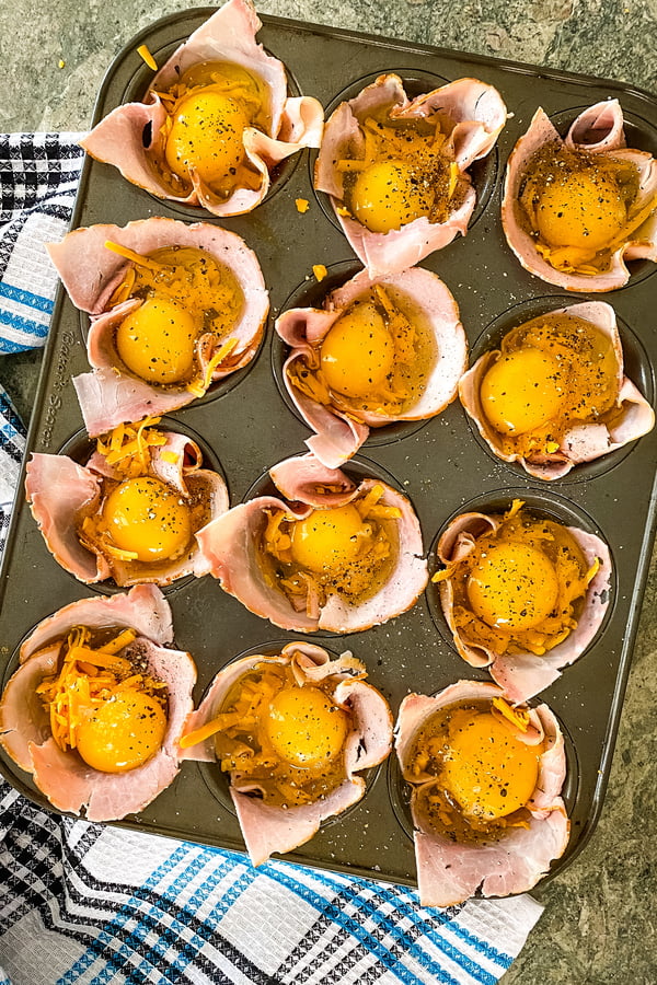 ham and egg cups ready to go in the oven