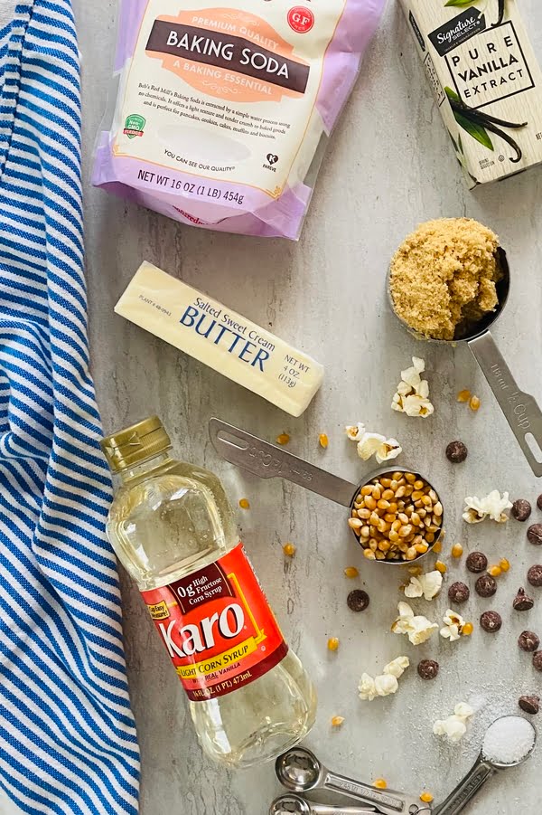 the ingredients for caramel corn - popcorn, brown sugar, butter