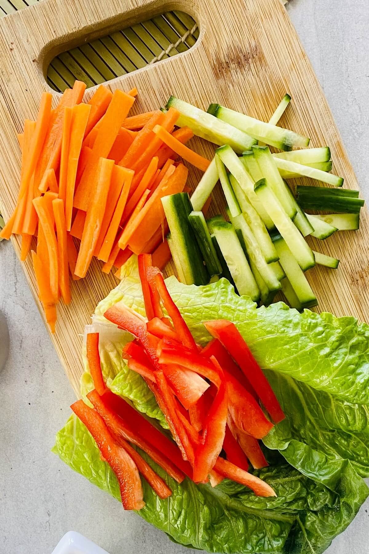 Julienned carrots, cucumbers, and red peppers.