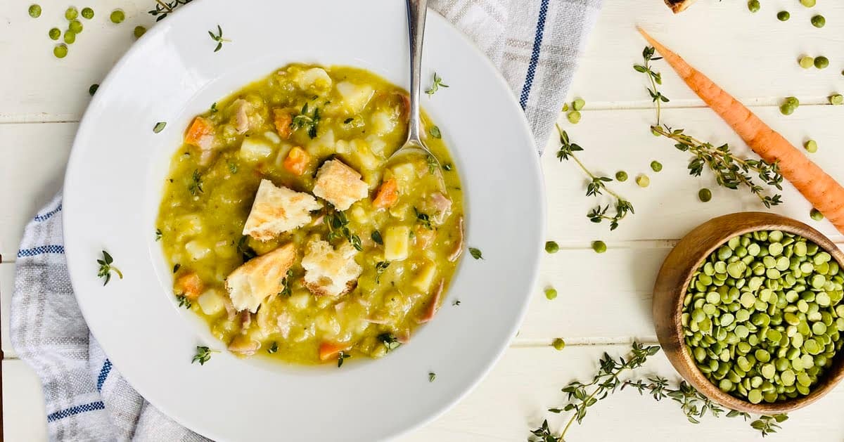 bowl of split pea soup with ham.