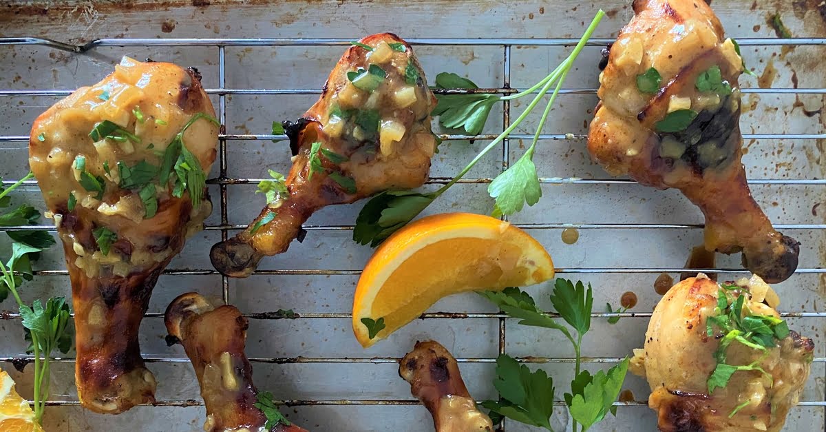 oven roasted chicken legs on a baking rack