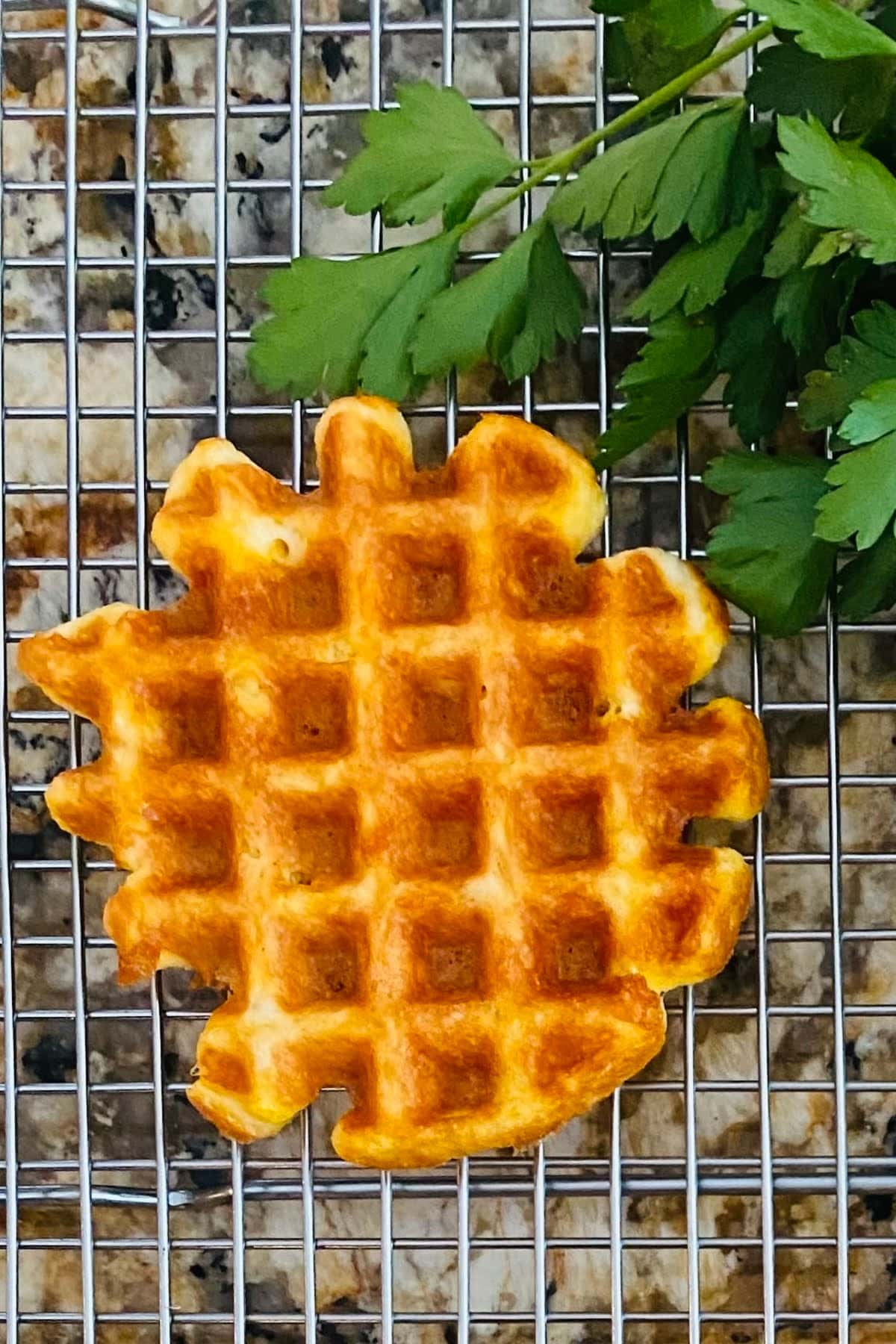 a waffle made with cheese, almond flour, egg whites and baking powder