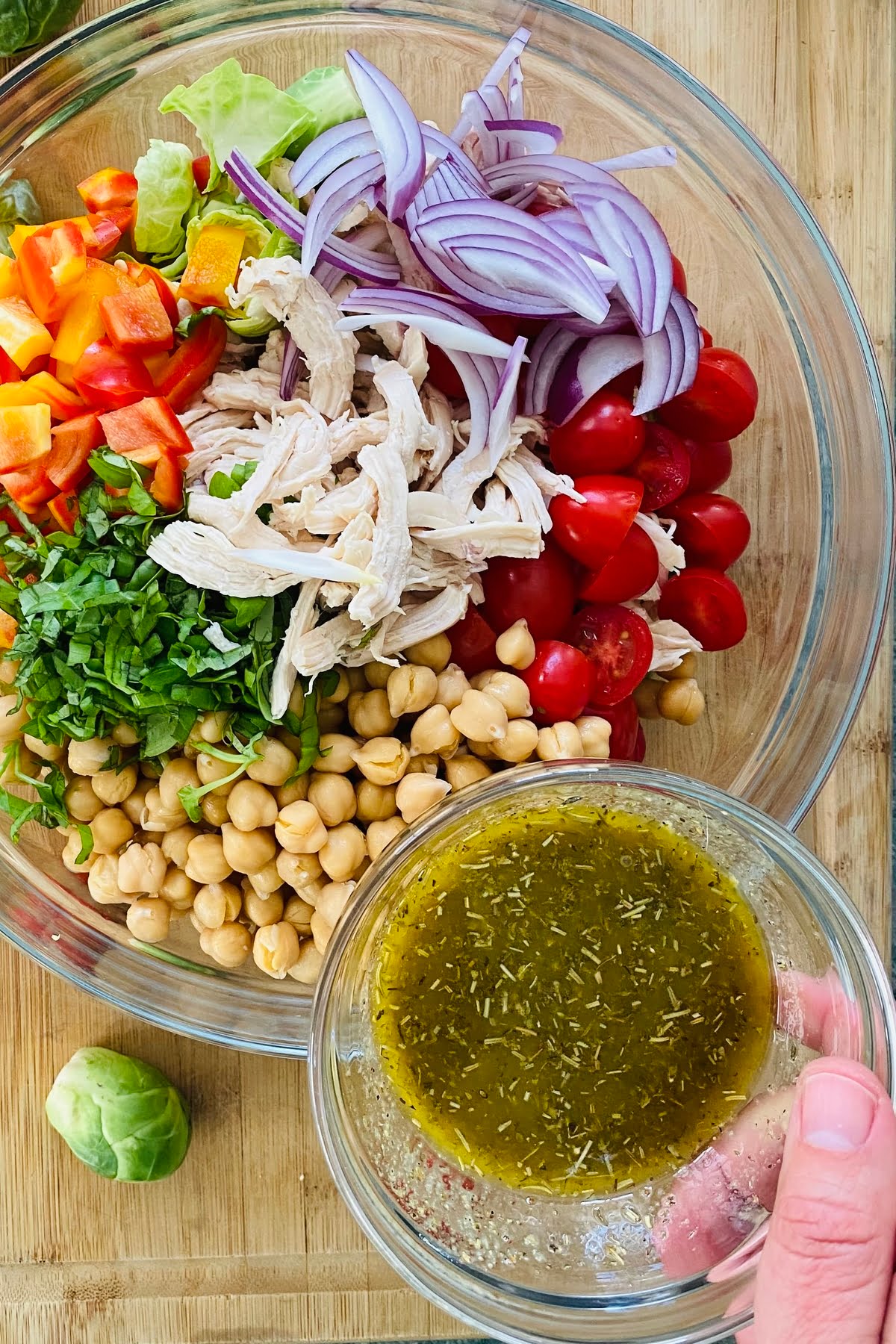 tomatoes, chickpeas, bell peppers, basil, red onion, and vinaigrette