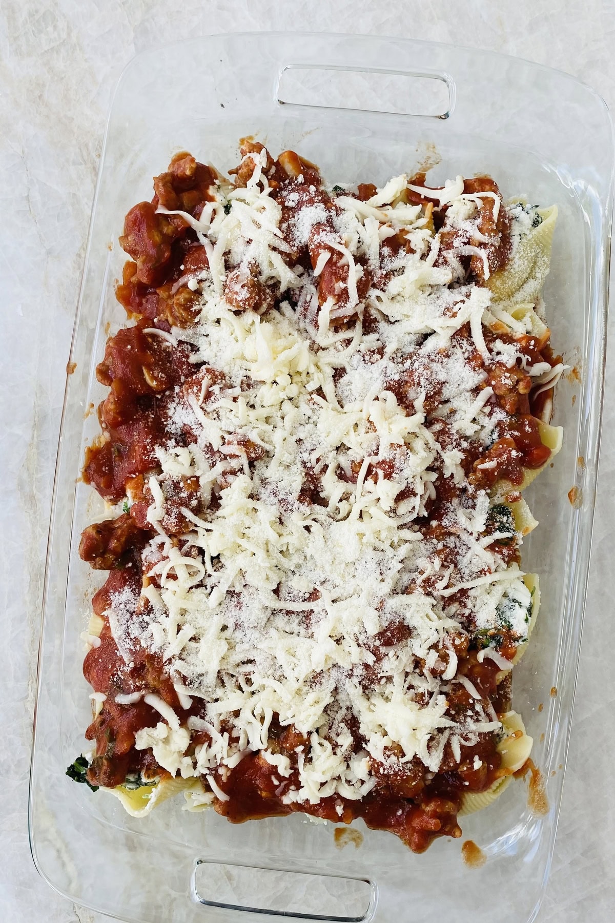 pan of unbaked stuffed pasta shells