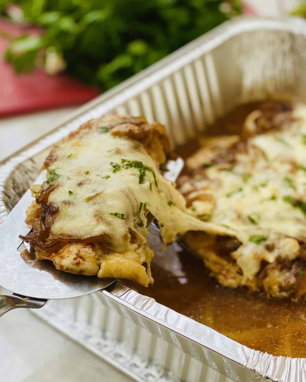 French onion chicken on a spatula