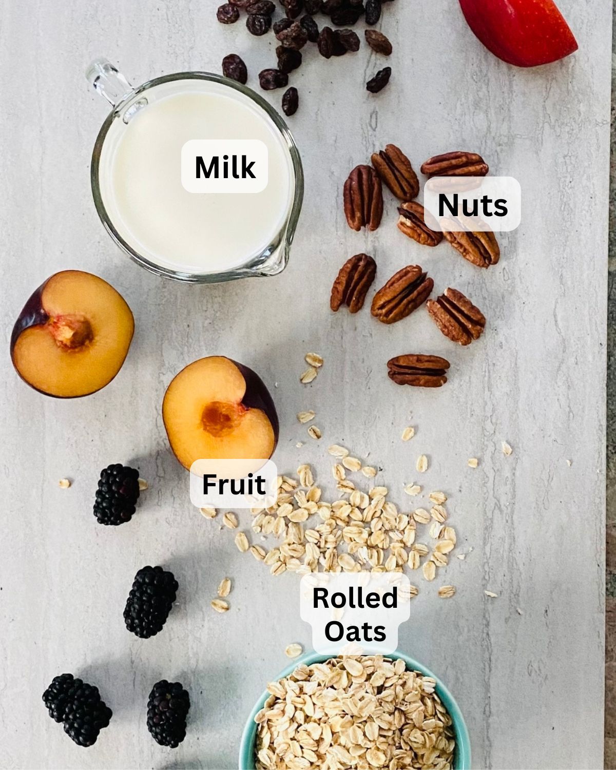 Rolled oats, plums, blackberries, milk, pecans.