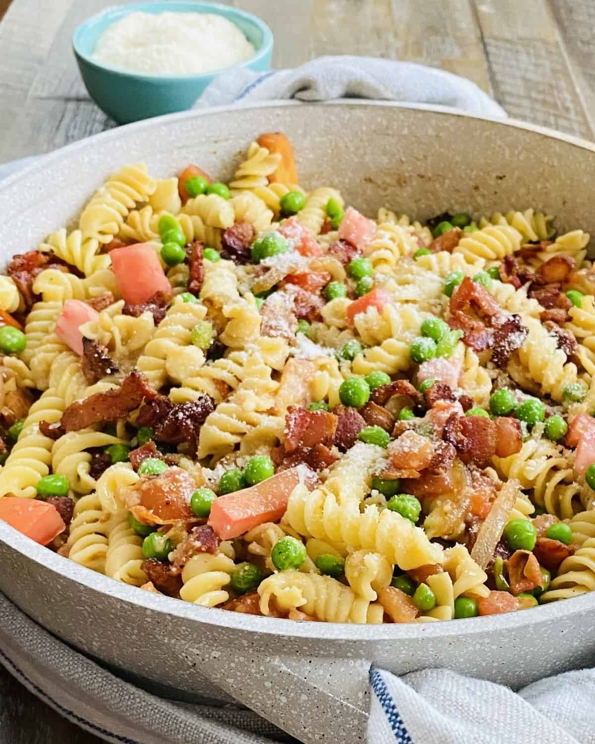 pasta with peas, bacon and tomatoes.