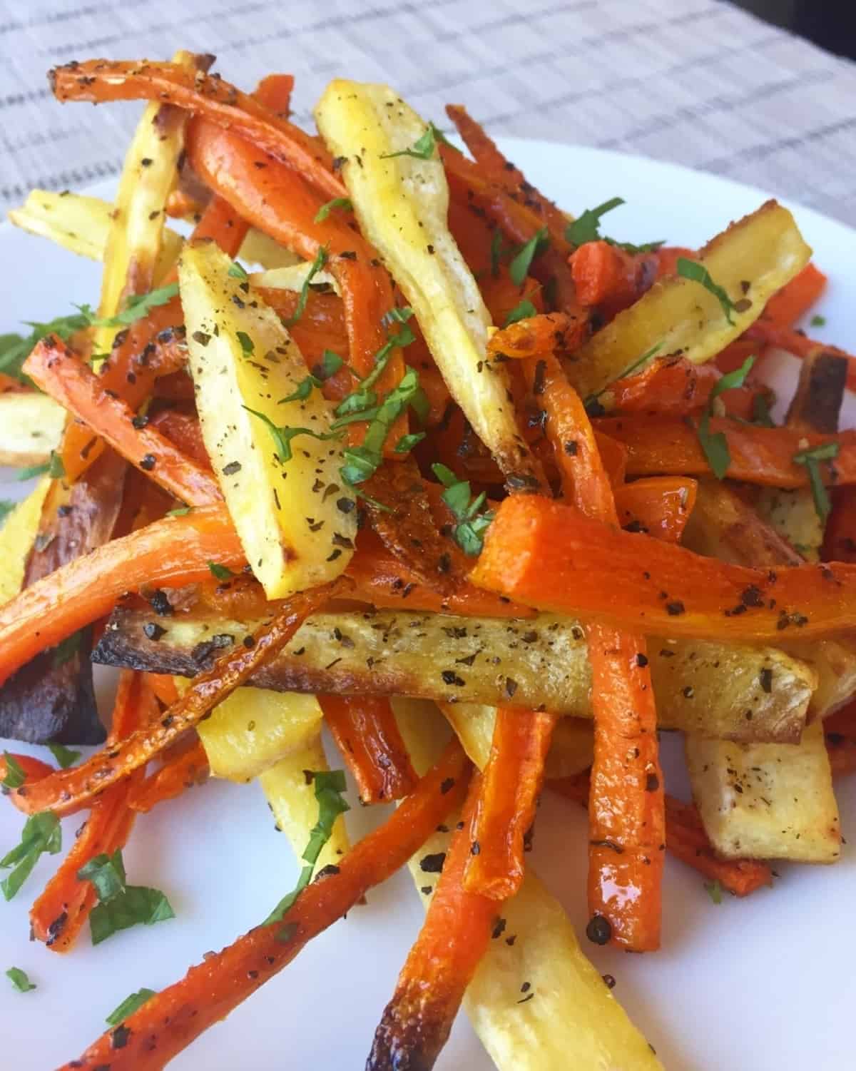 thanksgiving side dish of roasted carrots and parsnips