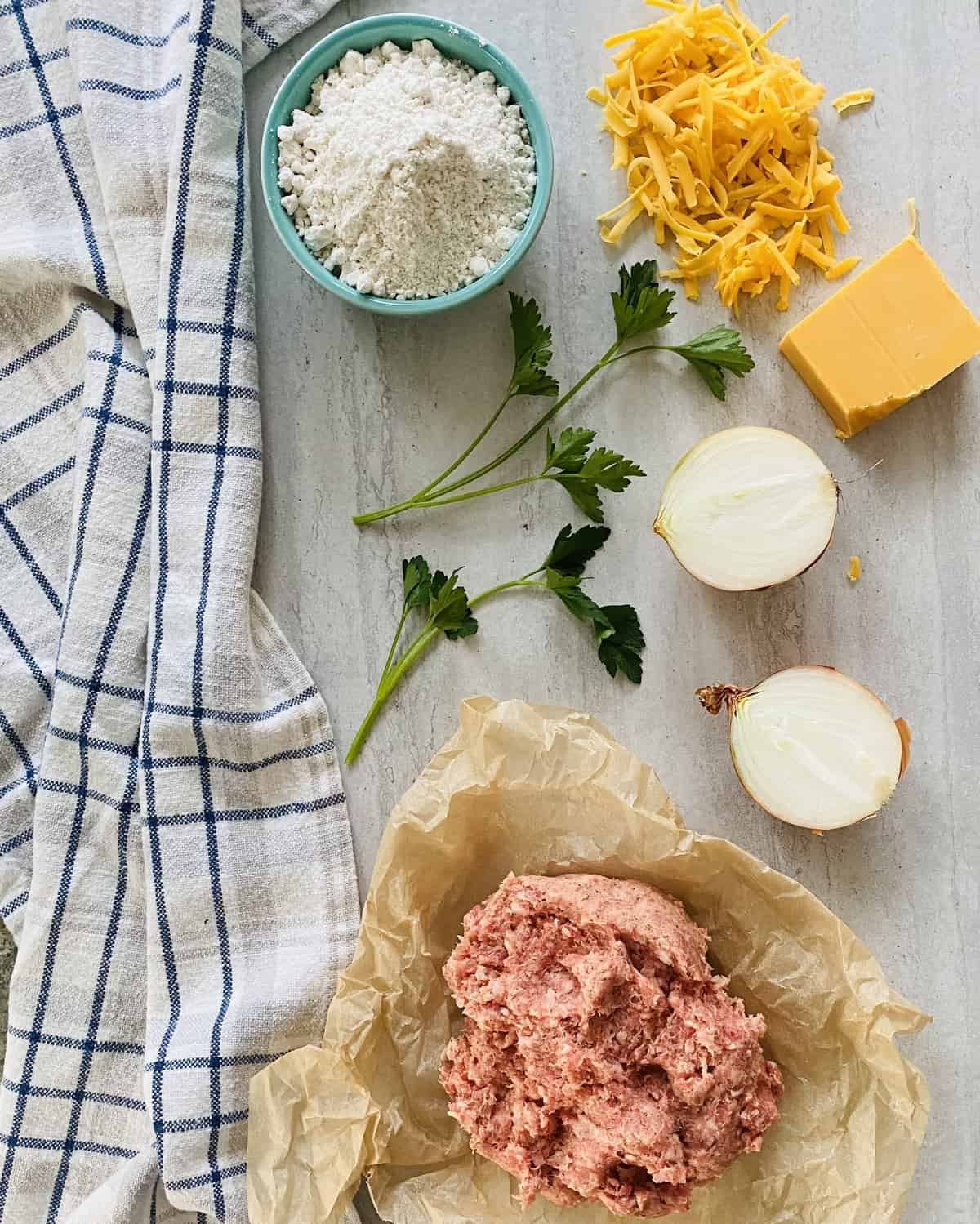 sausage cheese balls ingredients including pork sausage, cheddar cheese, and Bisquick