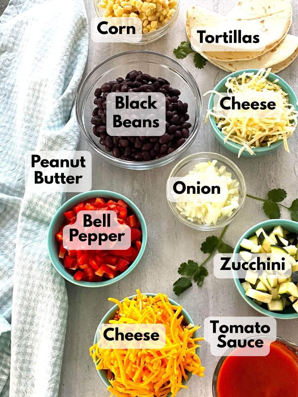 Black beans, shredded cheese, red peppers, onions, tortillas.
