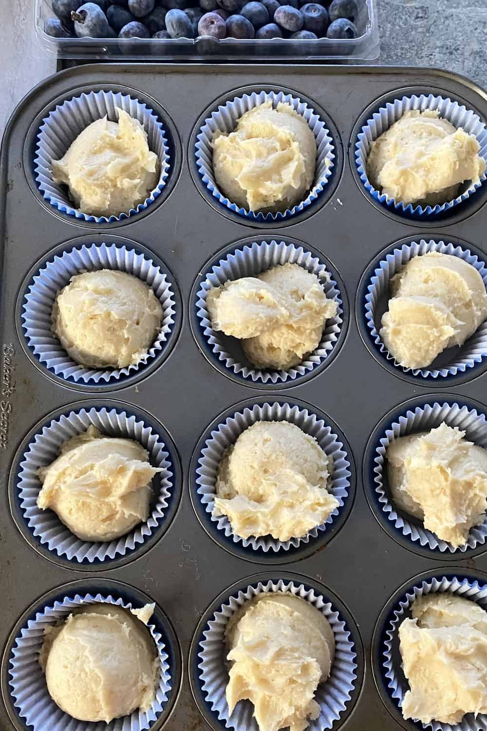 Muffin batter in a pan.