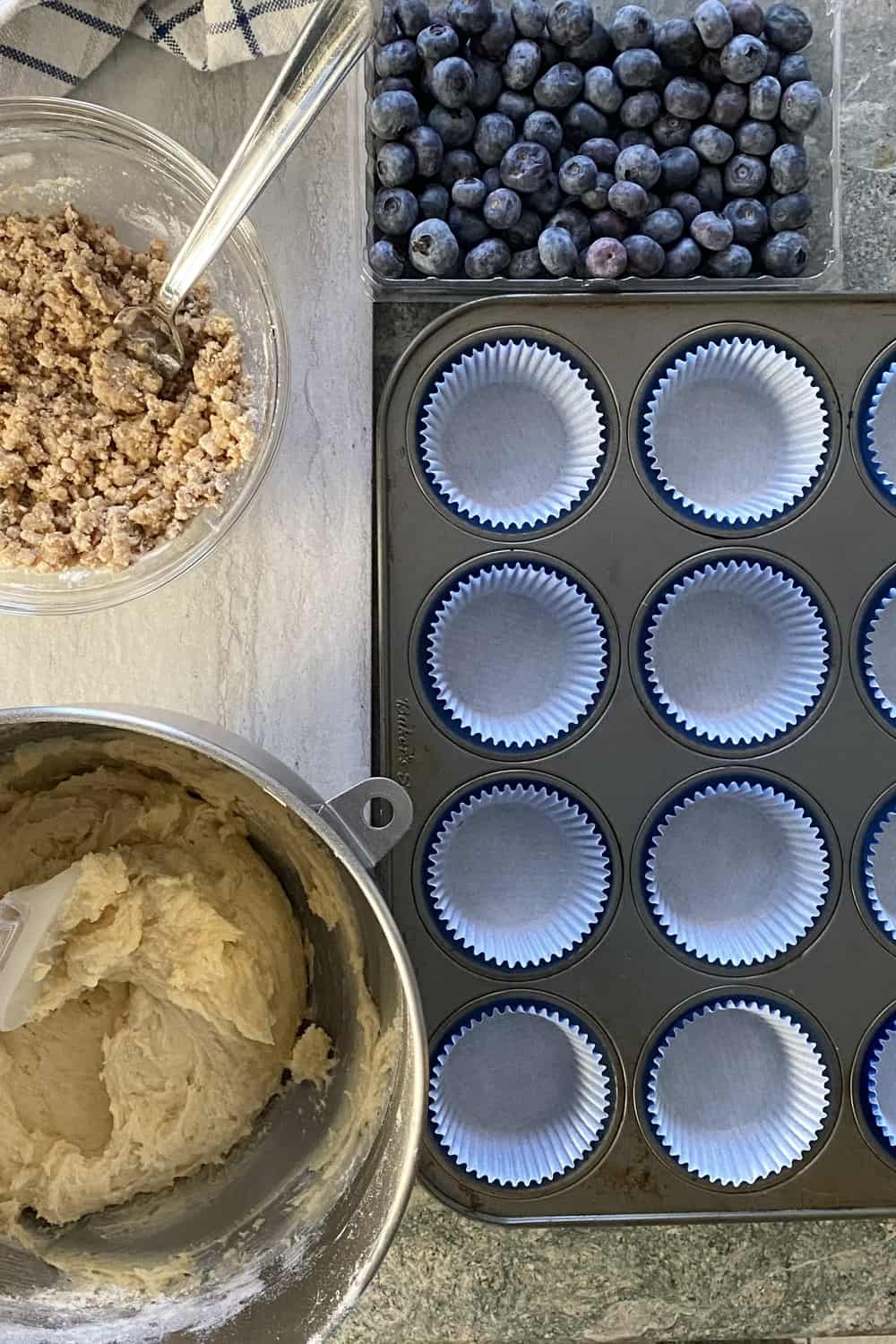 Muffin batter and a liner filled pan.