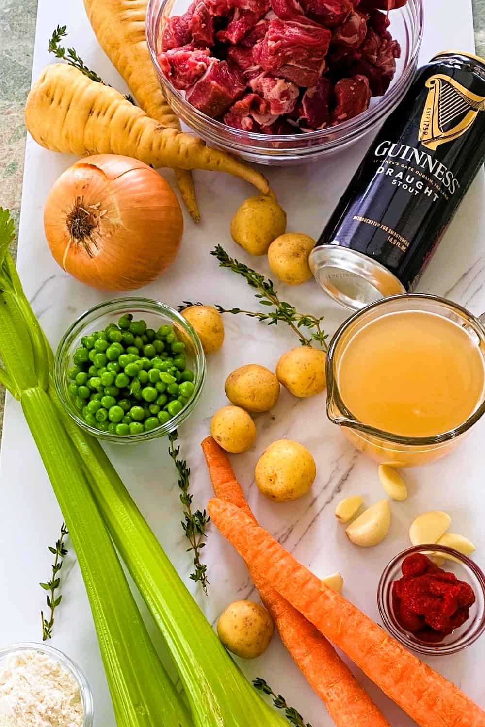 Guinness beer, peas, potatoes, lamb, onion, turnips, celery