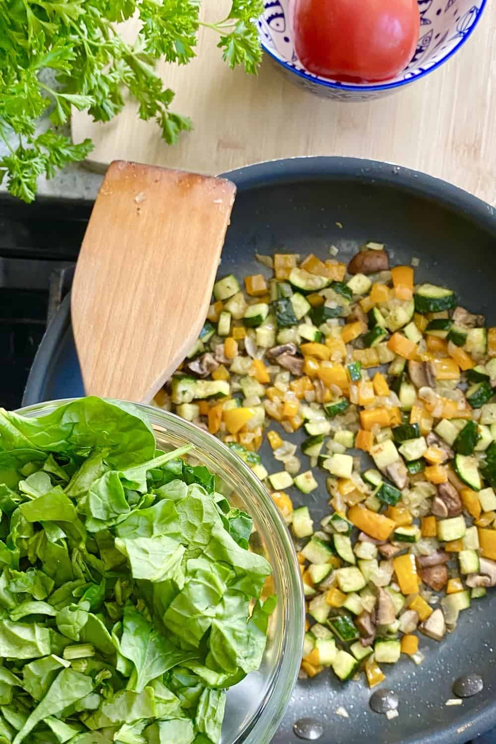 Sauteing vegetables for a frittata.