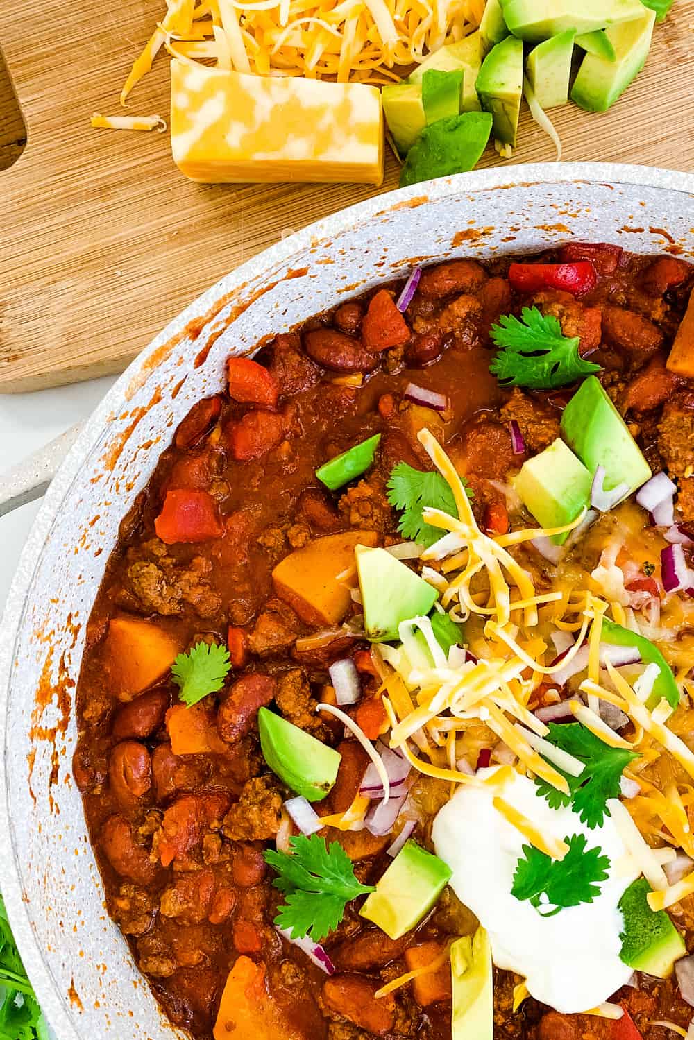 A pot of chili with beans and butternut squash.