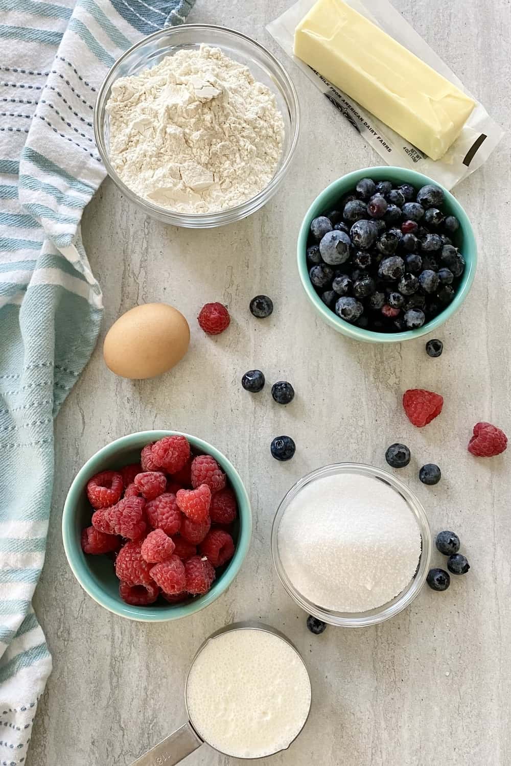 blueberries, raspberries, flour, butter, sugar, heavy cream