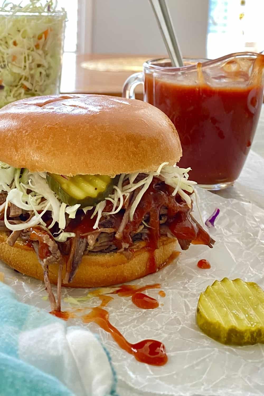 bbq sauce on a brisket sandwich