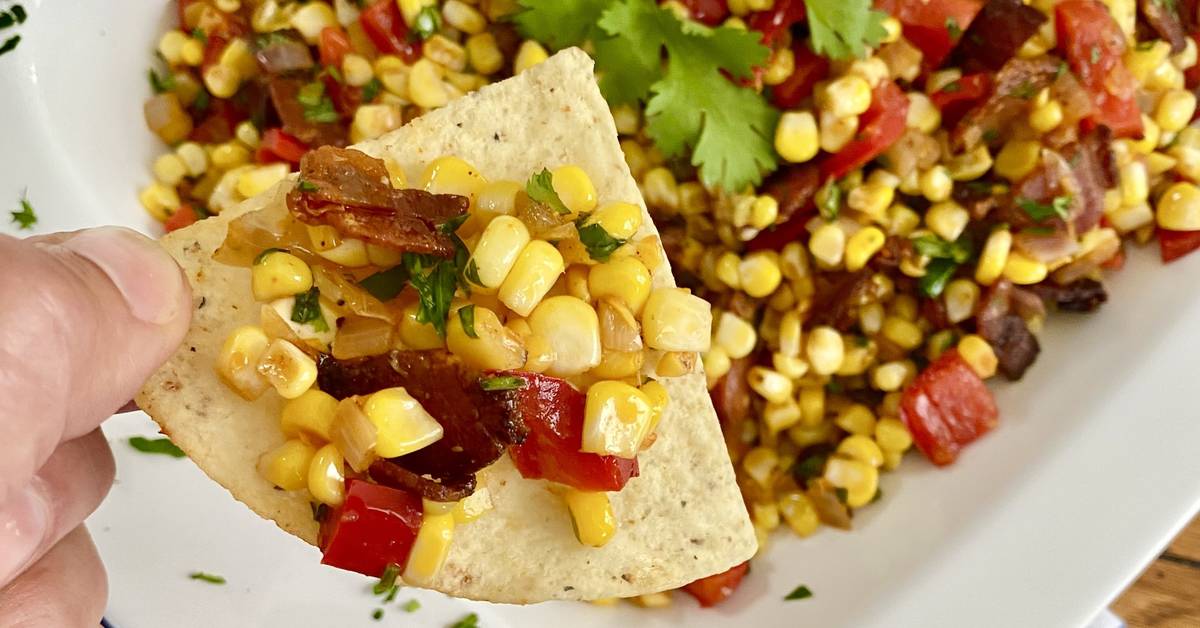 sweet corn salad on a tortilla chip