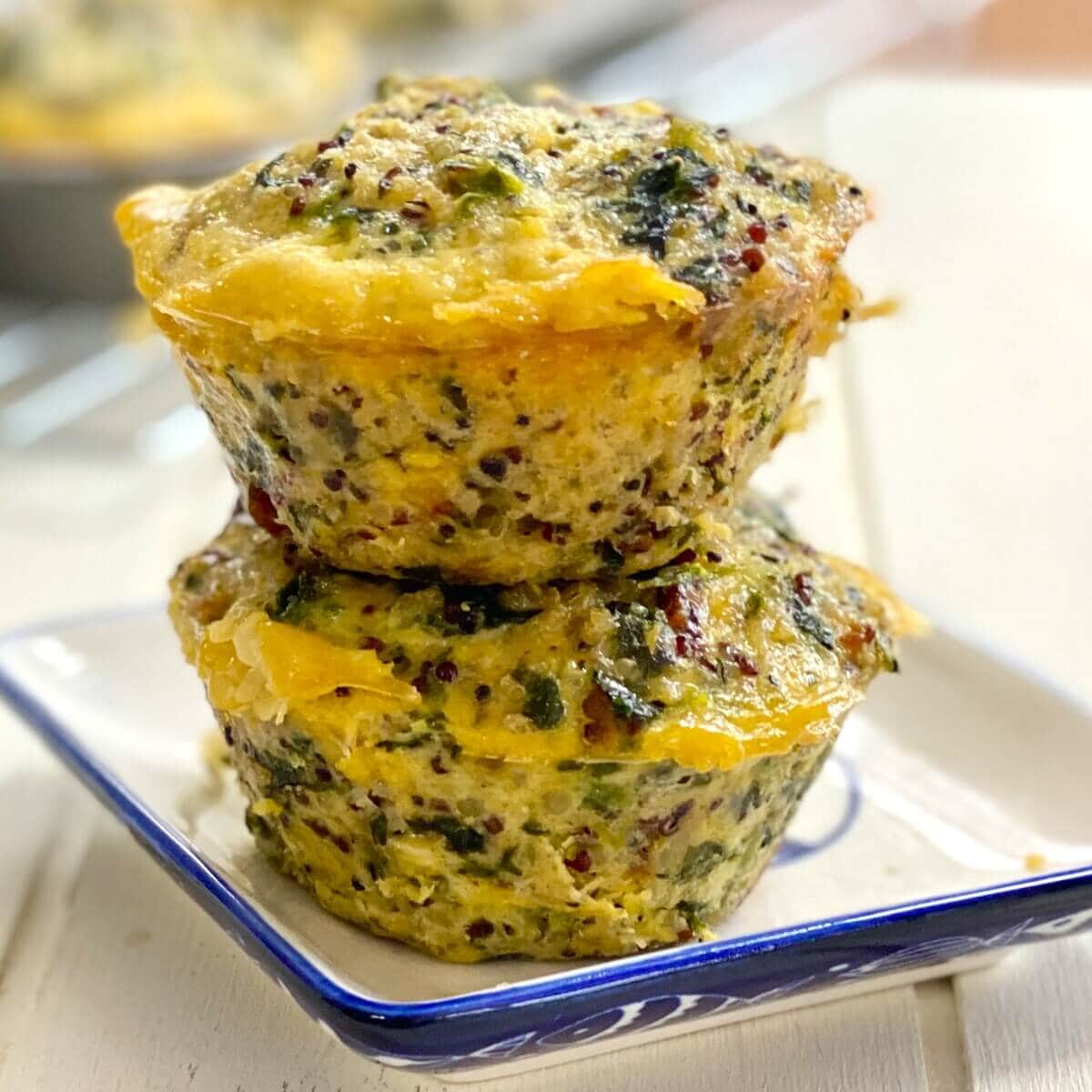 2 quinoa egg muffins stacked on top of each other.