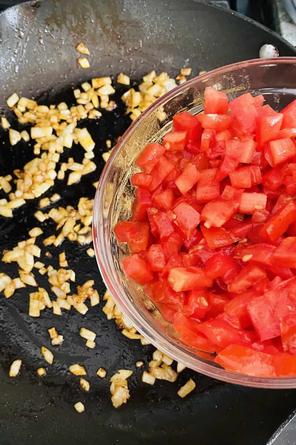 sautéing onions and adding tomatoes