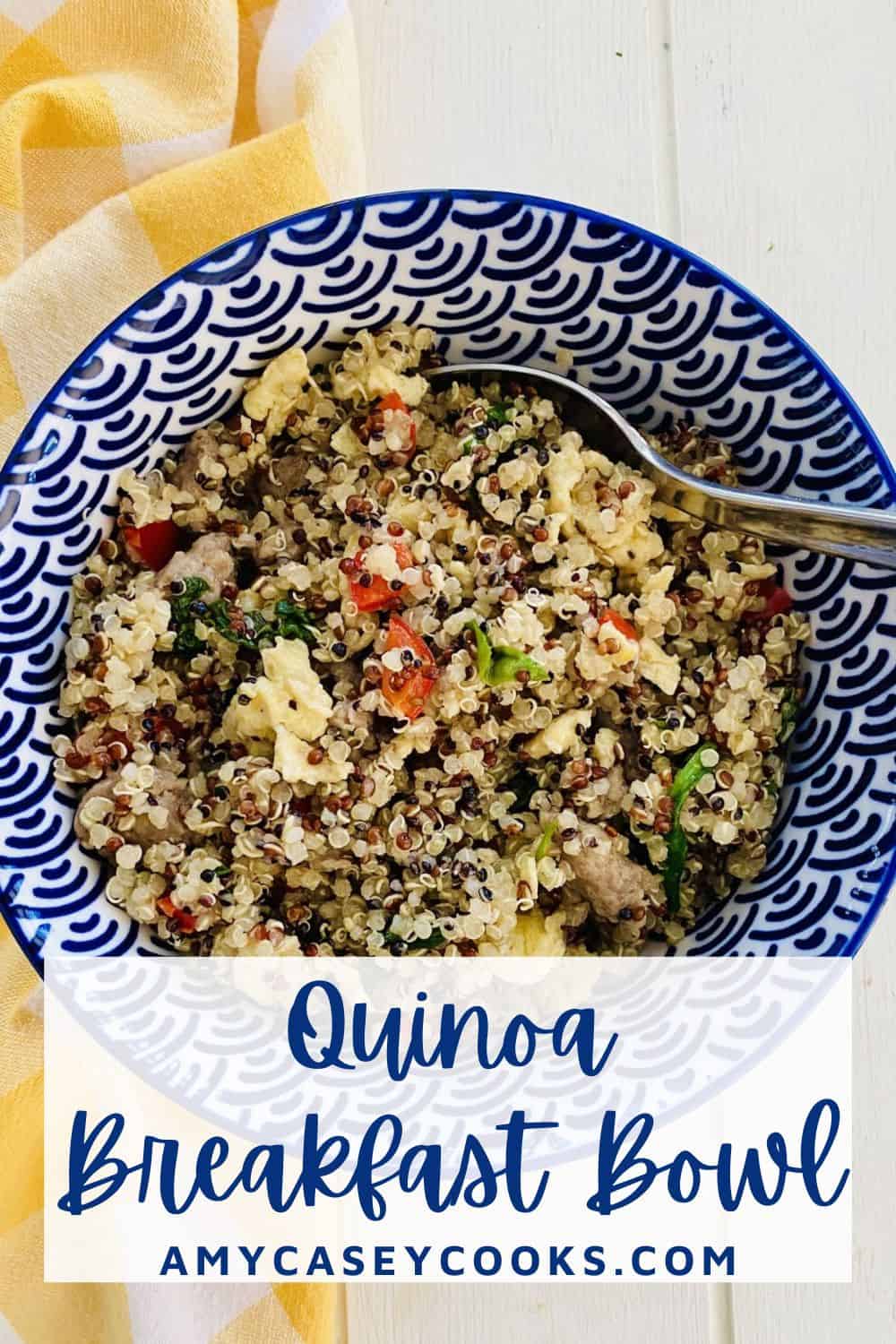 A spoon in a savory quinoa breakfast bowl.
