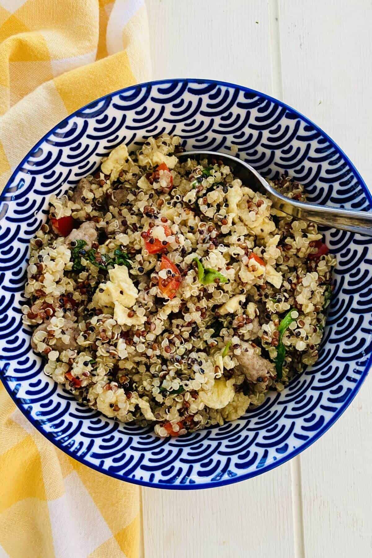 Savory Quinoa Breakfast Bowl with Egg, Sausage and Spinach