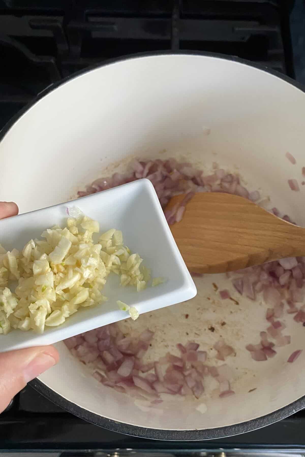 Sauteing red onions and garlic.