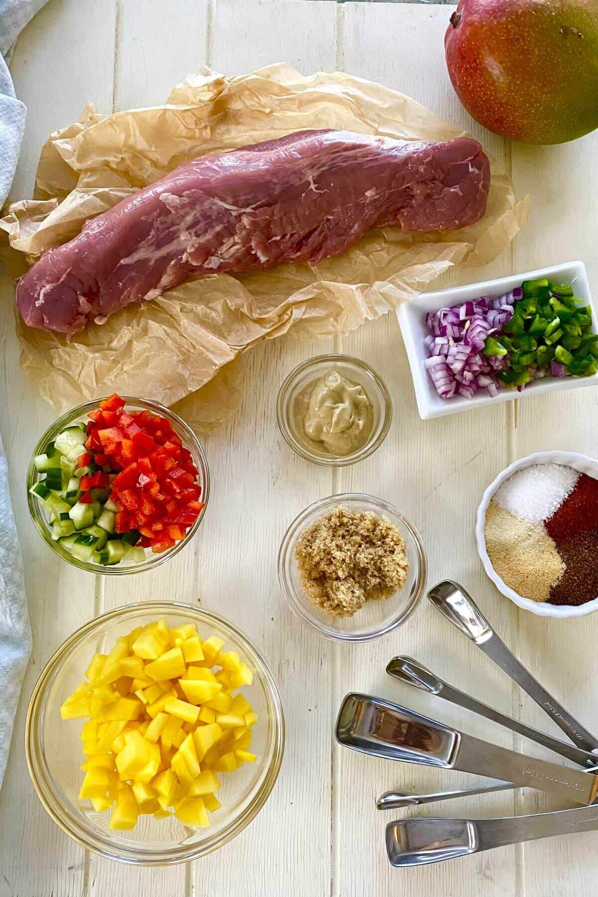Pork tenderloin, mango, cucumber, jalapeno, brown sugar, mustard, red pepper.