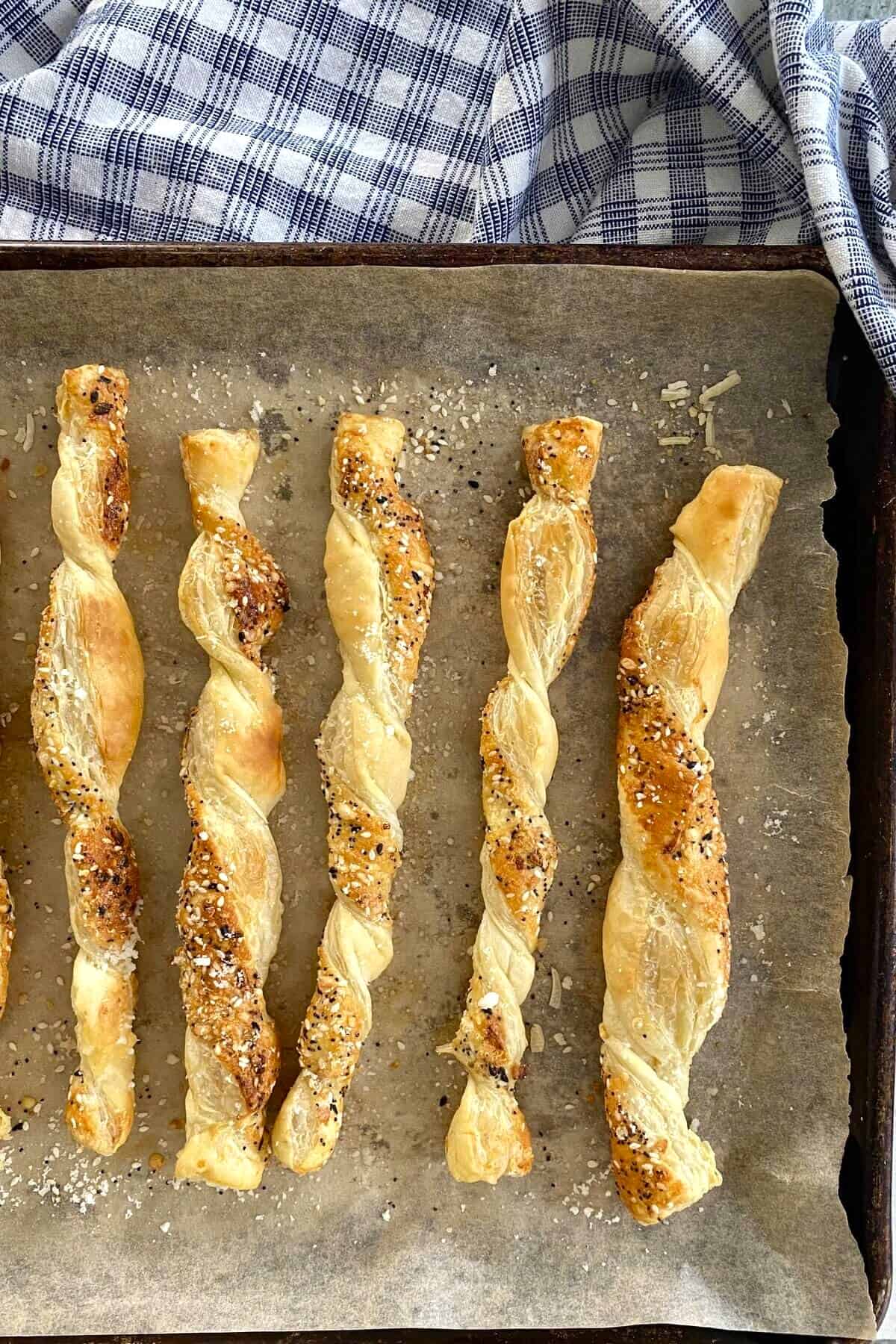 baked cheese twists on baking sheet