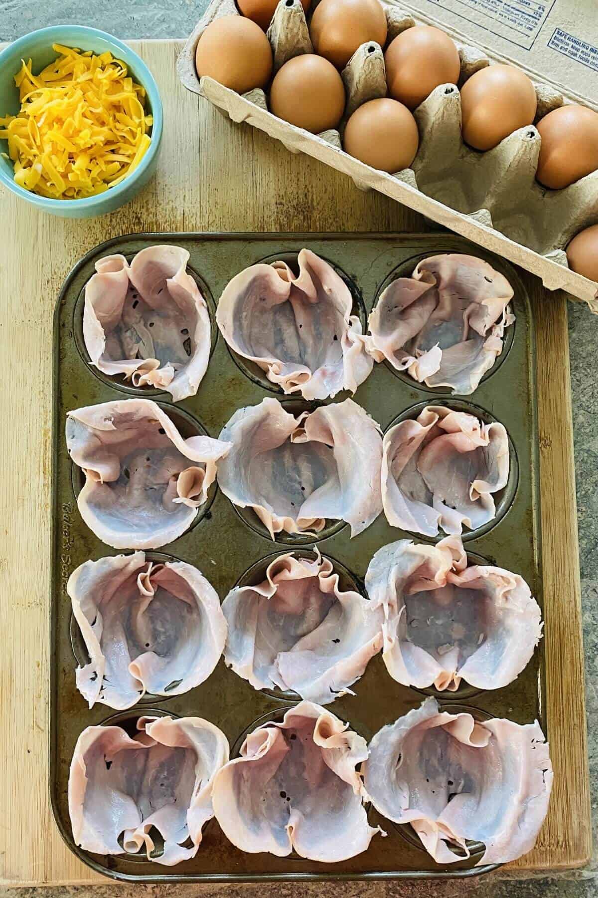 ham in a muffin pan.