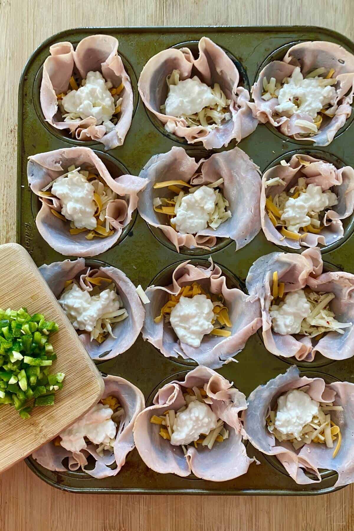 ham cups with 3 cheeses and chopped jalapeno.