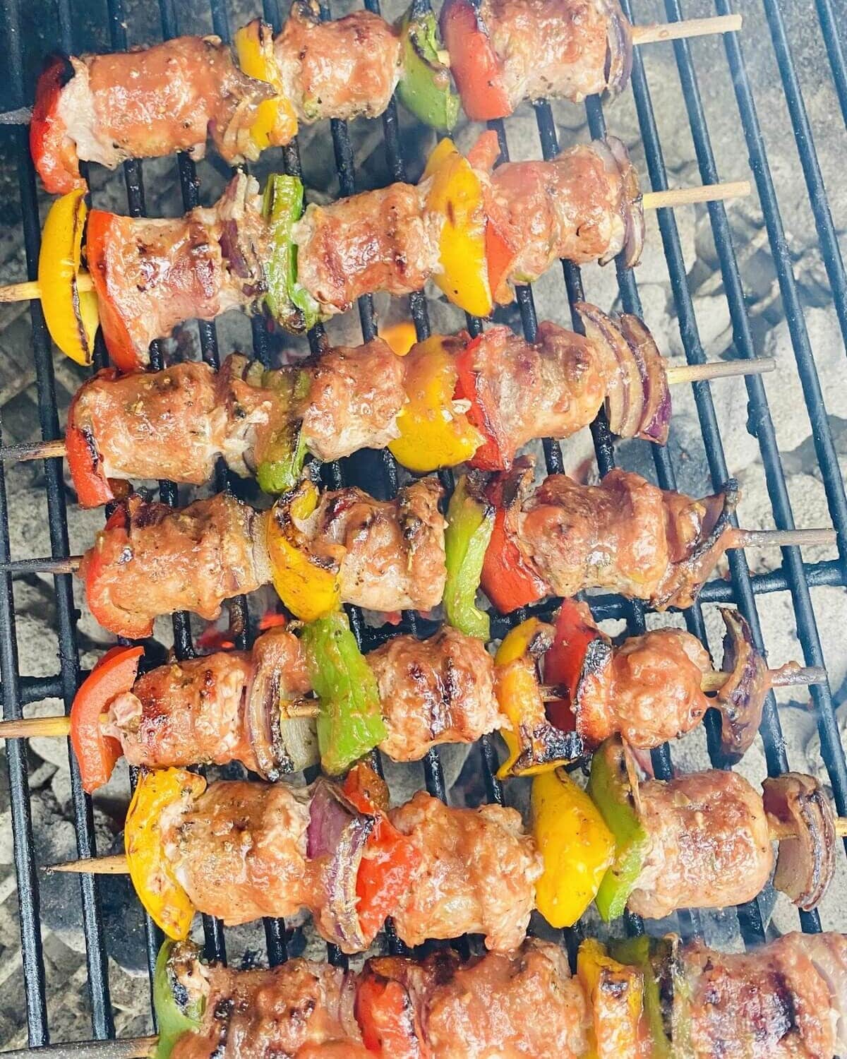 Grilled sausage kabobs on a Weber grill.
