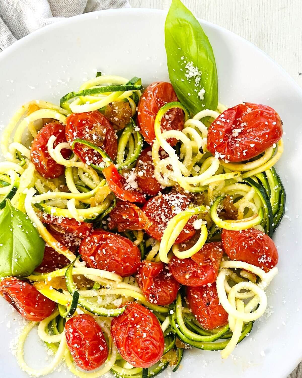 oven roasted cherry tomato sauce with zucchini noodles.