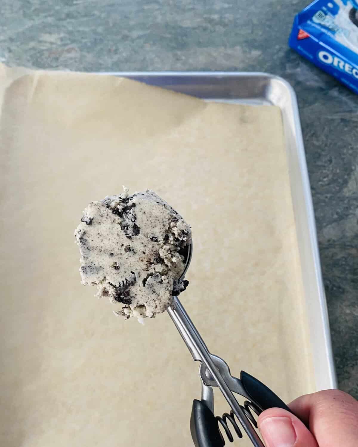 cookie scoop filled with dough.