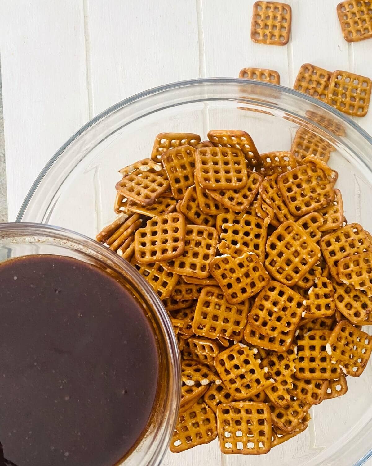adding pumpkin spice to pretzels.