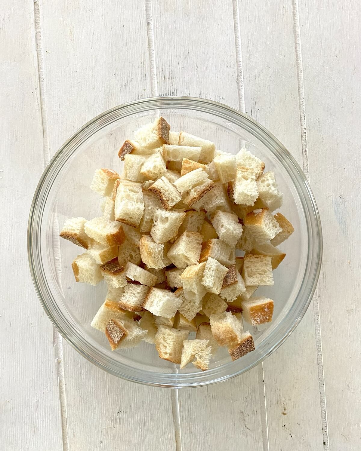 bread cubes in a glass bowl.